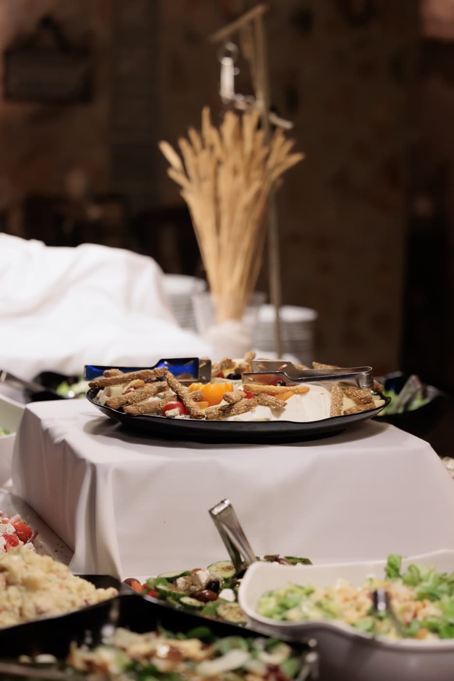 Catering buffet with salads and appetizers at Ktima Filokalis wedding Koropi