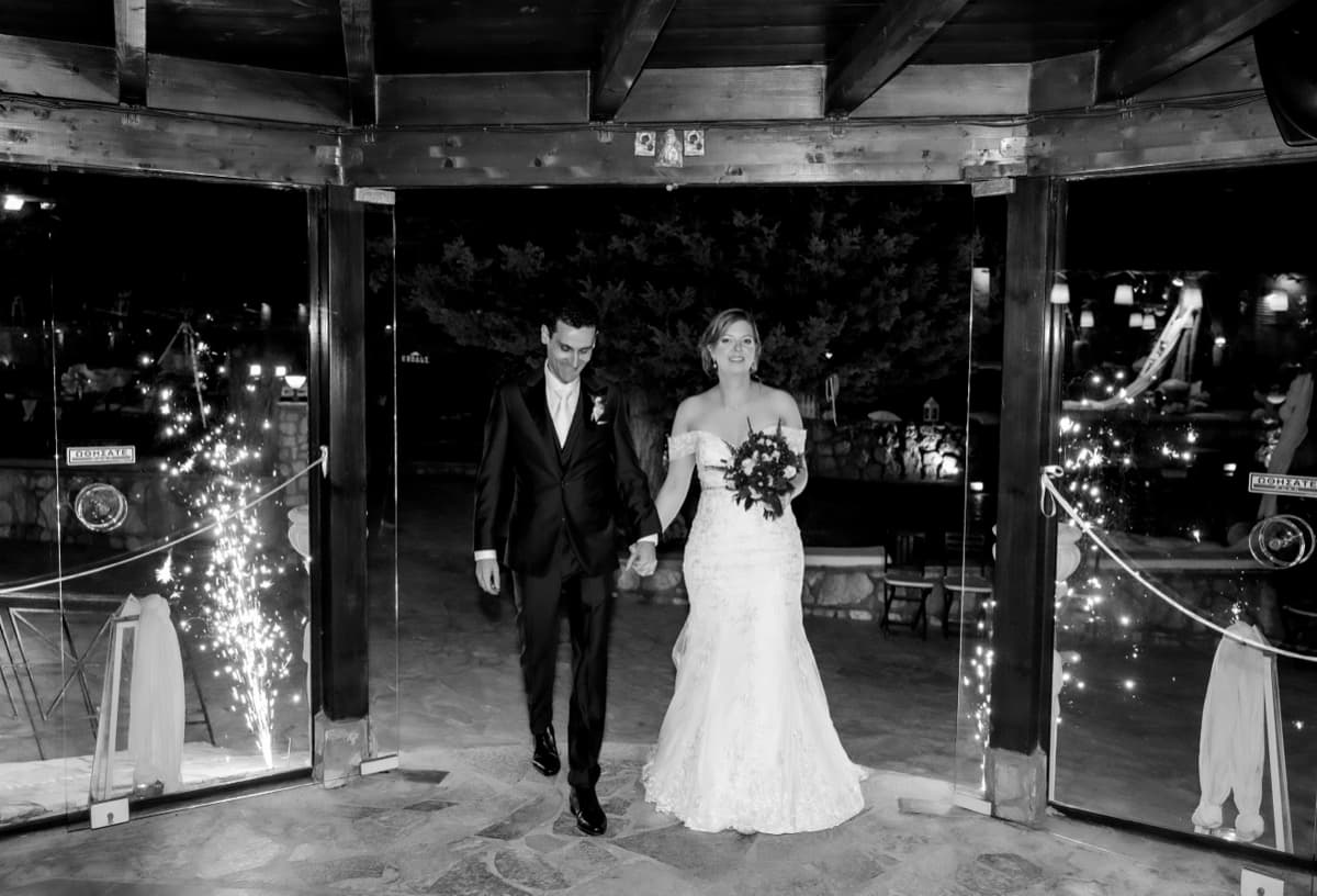 Newlywed entrance with sparkler fountains at Ktima Filokalis wedding Koropi