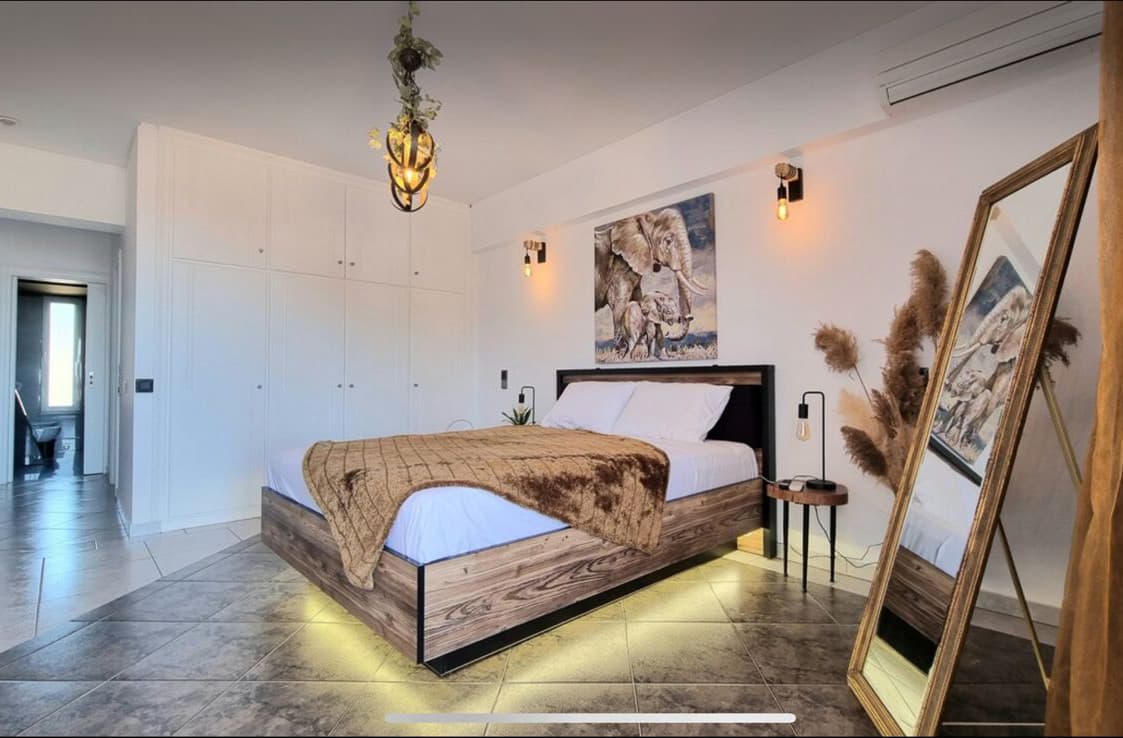 Flower bouquets and soft lighting in the bridal suite at Ktima Filokalis wedding venue